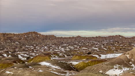 Rugged-Beauty-Of-Badlands-National-Park-In-The-Morning-Light-In-South-Dakota-With-Clouds-Moving-Above