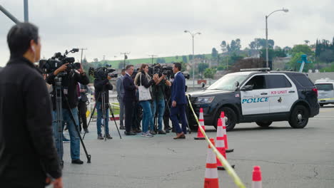 Police-and-Journalists-Outside-the-Star-Ballroom-Dance-Studio-After-the-Mass-Shooting