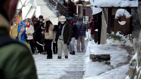 People-Walking-in-Snowy-Stairs,-Higashiyama-and-Gion,-Kyoto,-Japan