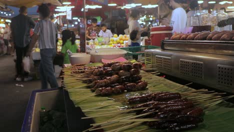 Busy-Night-Market-In-Rayong-With-People-Buying-And-Selling-Variety-Of-Food