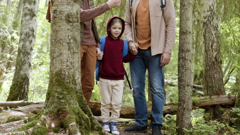 Happy-family-walking-in-nature