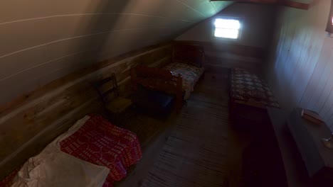Bedroom-upstairs-in-the-cabin-Historic-site-at-the-Peter-Whitmer-Farm-location-in-New-York-in-Seneca-County-near-Waterloo-Mormon-or-The-Church-of-Jesus-Christ-of-Latter-day-Saints