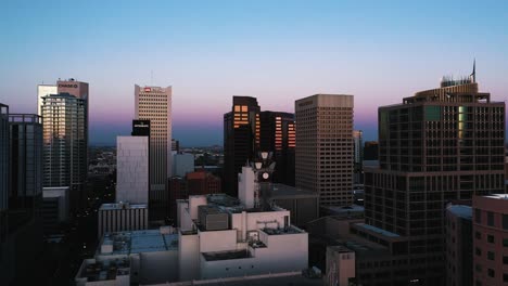 Aerial-view-of-the-downtown-skyscrapers-in-Phoenix,-Arizona-at-sunset