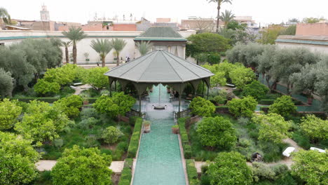 Tilt-up-shot-over-Secret-Garden-at-Le-Jardin-Secret-palace-complex,-Marrakesh