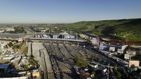 Aerial-view-towards-the-San-Ysidro-US-Border-Ports-of-Entry,-sunny-day-in-Tijuana,-Mexico