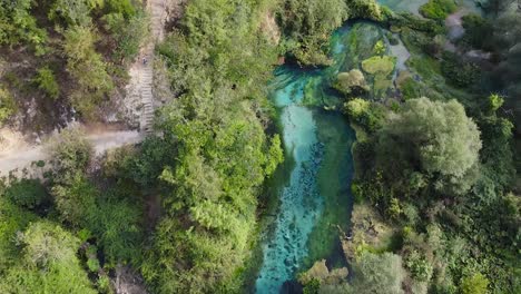 Drone-view-of-the-blue-eye-in-Albania,-spring-of-turquoise-waters,-Saranda