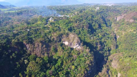 beautiful-aerial-view-with-drone-of-flying-over-ravine-in-the-jungle-of-Ixhuatlan-del-café,-Veracruz,-Mexico