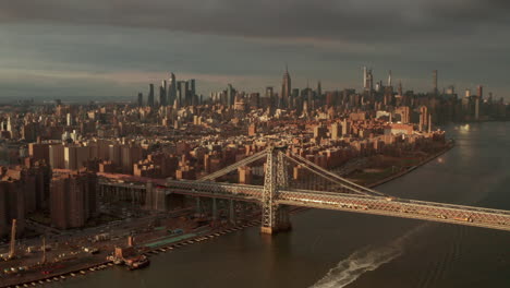 Aerial-slider-shot-of-the-Williamsburg-bridge-with-the-Manhattan-skyline-in-the-background