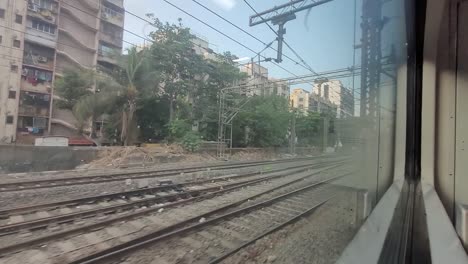 Mumbai-AC-local-train-crossing-Vikhroli