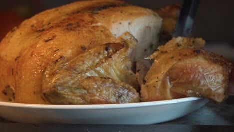 Carving-Rotisserie-Chicken-on-Plate