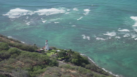 Aerial-View-of-the-Diamond-Head-Lighthouse-With-the-Calm-Blue-Pacific-Ocean-Behind-It-on-a-Clear-Sunny-Day