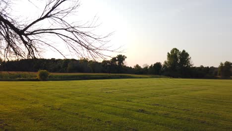 Fields-next-to-the-cabin-at-the-Historic-site-at-the-Peter-Whitmer-Farm-location-in-New-York-in-Seneca-County-near-Waterloo-Mormon-or-The-Church-of-Jesus-Christ-of-Latter-day-Saints