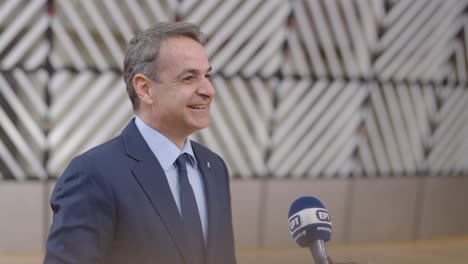 Greek-Prime-Minister-Kyriakos-Mitsotakis-giving-a-press-statement-during-the-European-Council-summit-in-Brussels,-Belgium---Close-up-shot