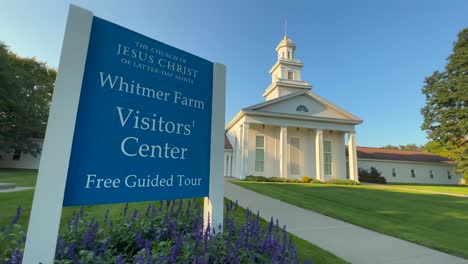 Sign-and-chapel-and-visitors-center-at-Historic-site-at-the-Peter-Whitmer-Farm-location-in-New-York-in-Seneca-County-near-Waterloo-Mormon-or-The-Church-of-Jesus-Christ-of-Latter-day-Saints
