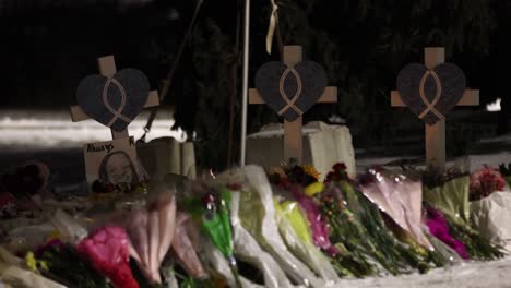 Michigan-State-University-Mass-shooting-memorial-at-the-Rock-with-crosses