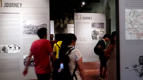 People-reading-Slave-Market-information-in-a-museum