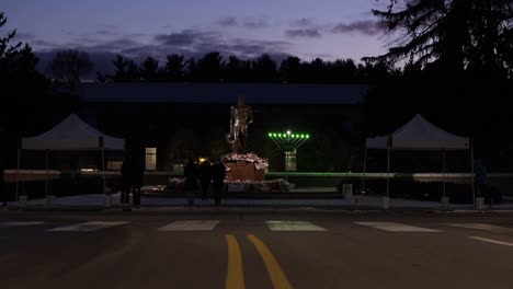 Michigan-State-University-Mass-shooting-memorial-at-The-Spartan-Statue-from-road-at-night