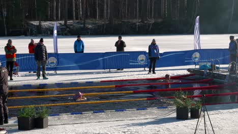 Breaststroke-Winter-Swimming-Competition-a-Fresh-Winter-Day,-Vansbro,-Sweden