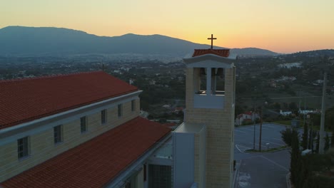 Aerial---Orthodox-church-at-sunset-in-Pallini,-Athens,-Greece