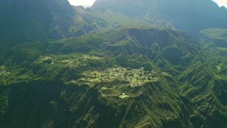 Drone-flying-away-from-La-Nouvelle-in-the-crater-of-the-cirque-du-Mafate-on-the-Island-of-La-Reunion