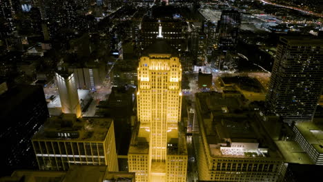 Drone-shot-towards-the-Board-of-Trade-building,-night-in-South-Loop,-Chicago,-USA