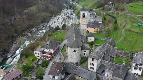 Ancient-stone-bell-tower-in-Val-Verzasca,-beautiful-valley,-Switzerland,-Ticino