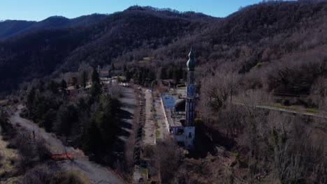 Aerial-View-Of-The-Minaret-At-Abandoned-Ghost-Town-Consonno