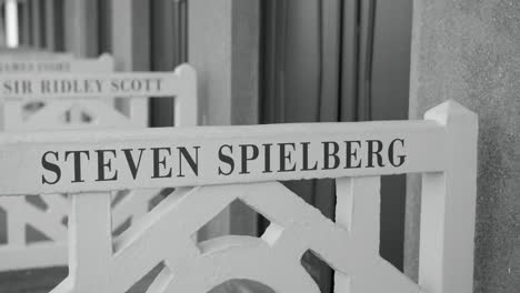 Film-Director-Steven-Spielberg's-Name-On-The-Famous-Wooden-Promenade-On-The-Beach-In-Deauville,-France