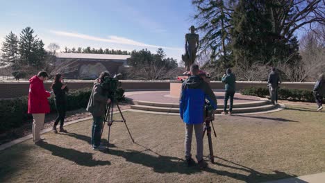 Media-gathered-at-Spartan-Statue-on-the-campus-of-Michigan-State-University-after-the-mass-shooting-in-2023-with-video-panning-left-to-right