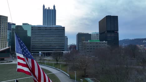 American-flag-waving-in-Point-State-Park-in-Pittsburgh,-Pennsylvania