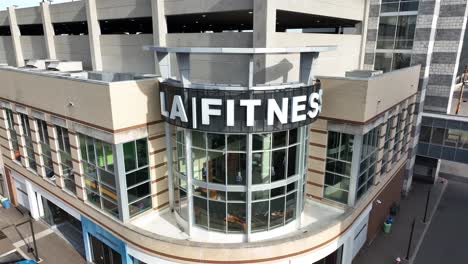 Orbit-around-LA-Fitness-gym-building-and-sign-in-Bakery-Square-Pittsburgh