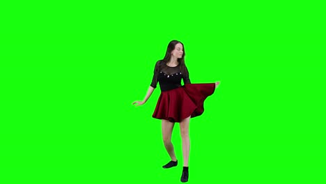 Beautiful-female-dancer-slowly-dancing-in-front-of-a-green-screen