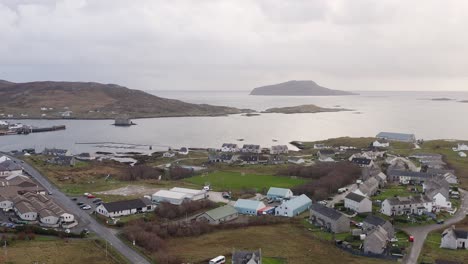 A-wide,-point-of-interest-drone-shot-of-Castlebay-and-the-surrounding-area