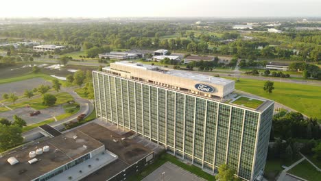 Ford-Motors-Company-office-building-on-sunny-day-in-Detroit,-aerial-orbit-wide-view