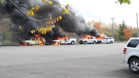 Shot-of-four-burning-Royal-Canadian-Mounted-Police-cruisers-following-shale-fracked-gas-protests-in-Elsipogtog-New-Brunswick-on-October-17,-2013