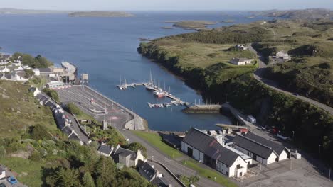 Drone-shot-of-the-village-of-Tarbert,-featuring-the-Isle-of-Harris-Distillery