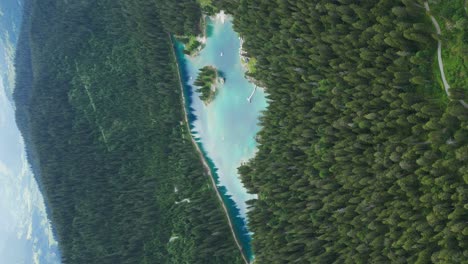 Aerial-View-Of-Lake-Forest-Mountains-Caumasee,-Switzerland