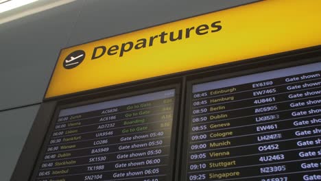 4k-airport-departures-board-slider-shot-terminal-airport-airline-jet-plane