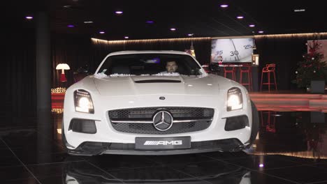 Gorgeous-Mercedes-AMG-backing-up-inside-the-dealership