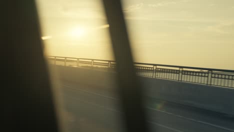 Beautiful-sunset-shot-from-inside-moving-car-while-moving