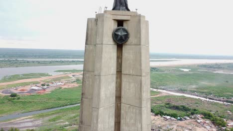 Close-up-aerial-view-of-the-monument-on-top-of-a-hill-near-the-Paraguay-river