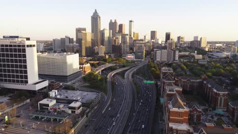 Aerial-drone-push-in-clip-over-the-famous-downtown-connector-interchange-in-the-heart-of-downtown-ATL