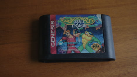 Close-Up-Pan-of-a-Battletoads-and-Double-Dragon-Video-Game-Cartridge-for-the-Sega-Genesis