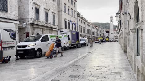 Early-morning-delivery-to-the-Main-Street-in-Dubrovnik,-Croatia
