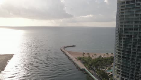 Silver-sunrise-aerial-past-Ritz-Carlton-Bal-Harbour-in-Haulover-Inlet