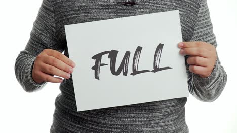 A-person-holding-a-sign-with-the-message-and-the-word-"full