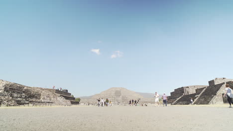 Travel-tourists-enjoy-the-Teotihuacan-Pyramids-outside-of-Mexico-City,-Mexico-on-a-sunny-day
