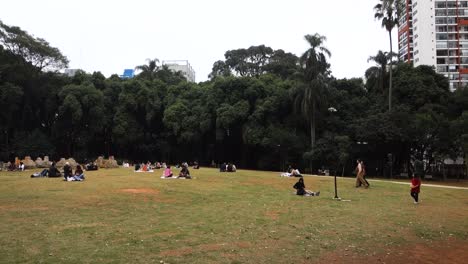 people-having-leisure-time-in-Parque-Augusta-city-park,-at-cloudy-day
