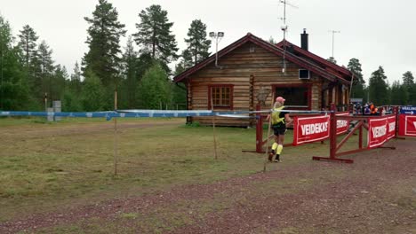A-female-ultra-runner-approaching-the-service-the-service-station-in-Risberg-on-her-journey-from-Sälen-to-Mora