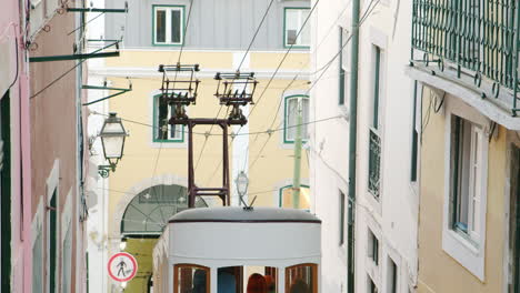 Urban-Scenery-of-Old-Funicular-Driving-Down-the-Hilly-Road-in-Lisbon